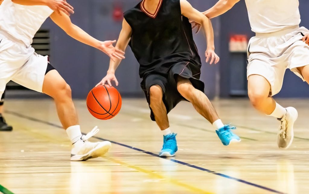 How Much Sleep Do Student Athletes Need? boys playing basketball